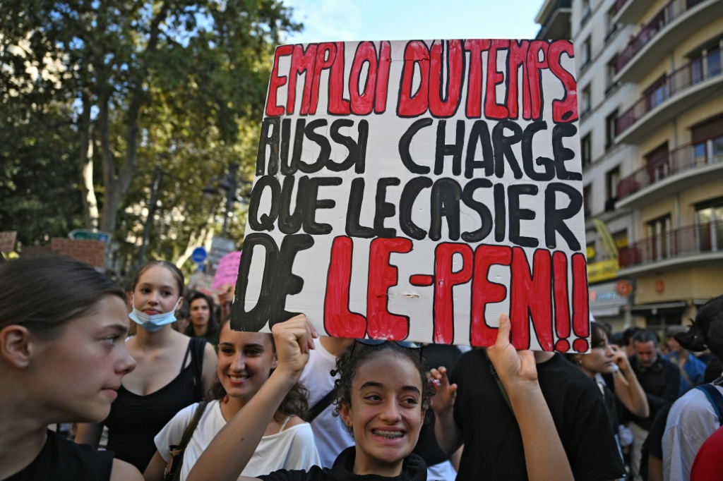 'Timetable as packed as Le Pen's criminal record': one sign at the demonstration in the southern city of Marseille — Miguel MEDINA / AFP