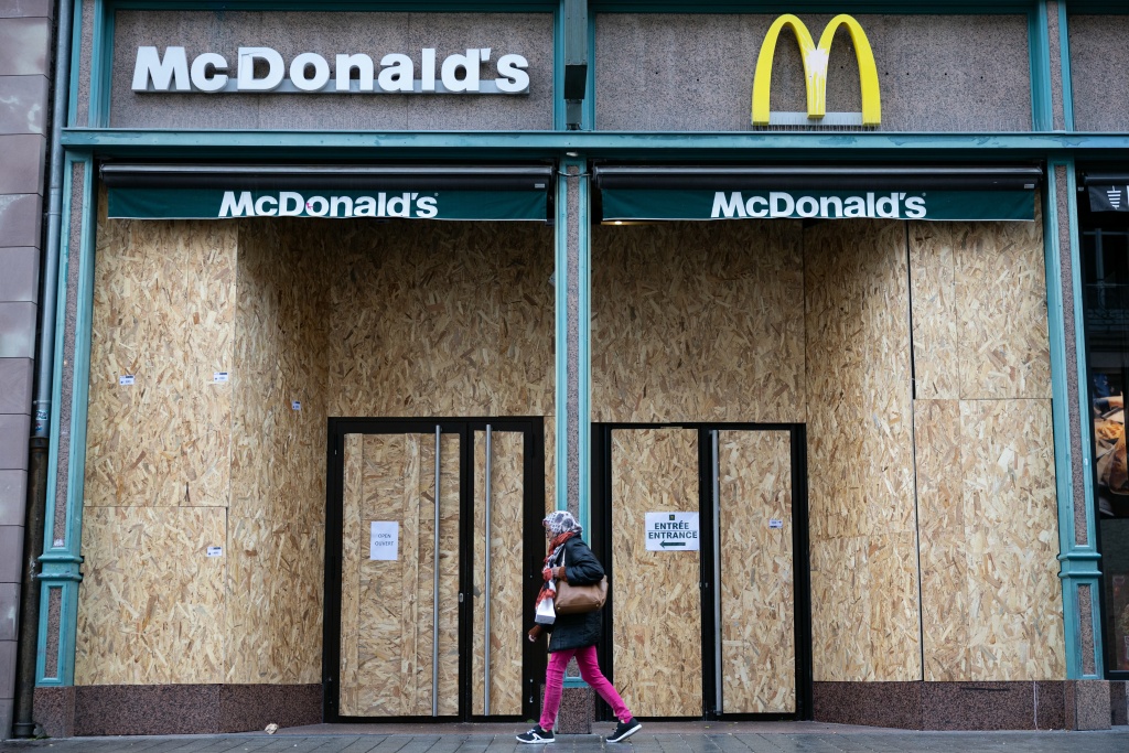 Shops boarded up their windows in preparation for the fresh demonstrations — ROMEO BOETZLE / AFP