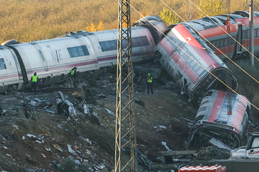 At daybreak, police drones were once again flying over the crash site — Oscar DEL POZO / AFP