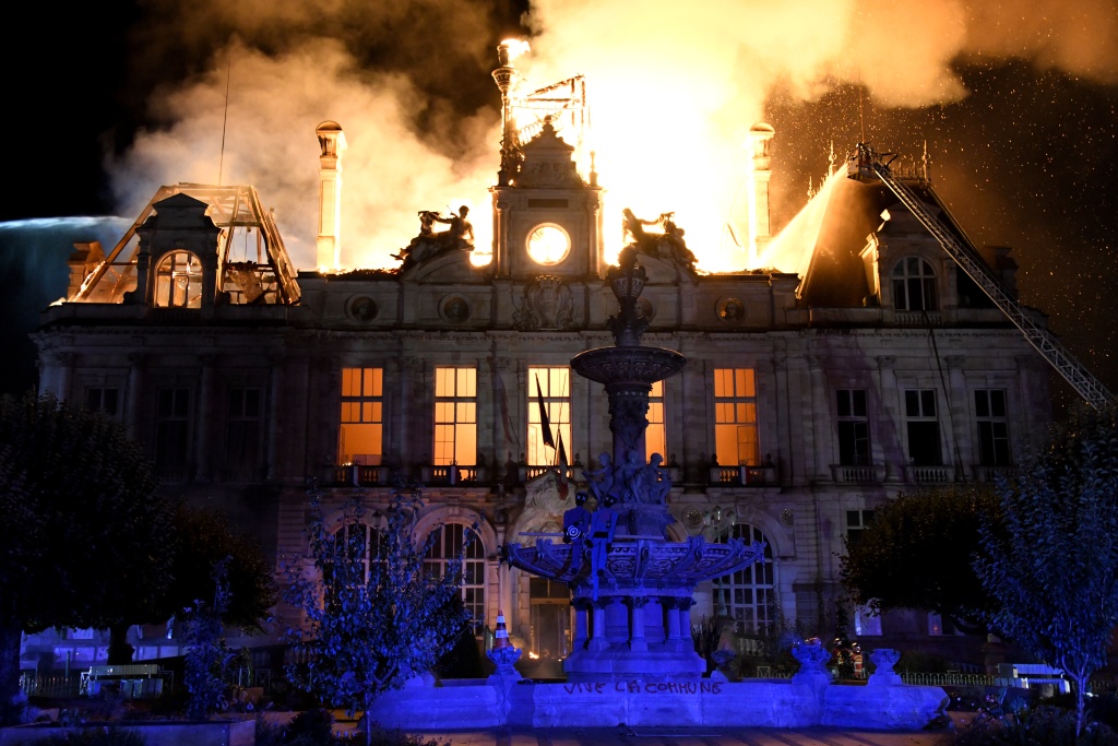 France counts cost of violent protests, 1,800 arrested