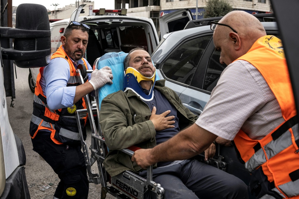 Israeli settlers beat AFP photographer covering West Bank