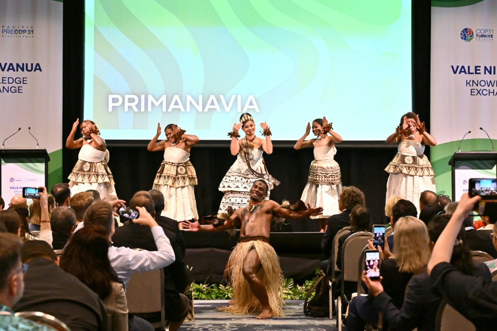 Traditional dancers perform at an opening ceremony of the Pacific Pre-COP31 Summit in Nadi on October 5, 2026. — Saeed KHAN / AFP