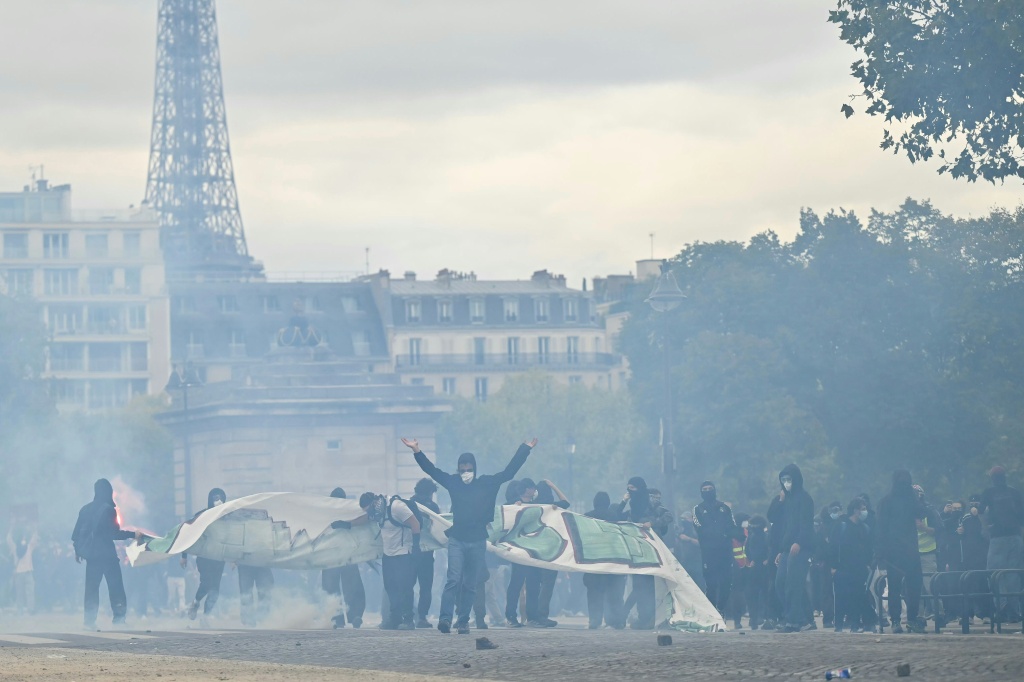 Authorities said 41,500 people marched in Paris, where clashes broke out with police — LOU BENOIST / AFP