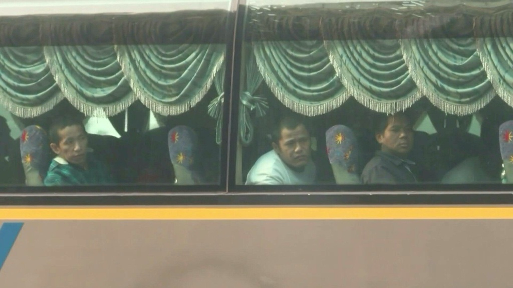 Malaysia returns migrants to war-torn Myanmar