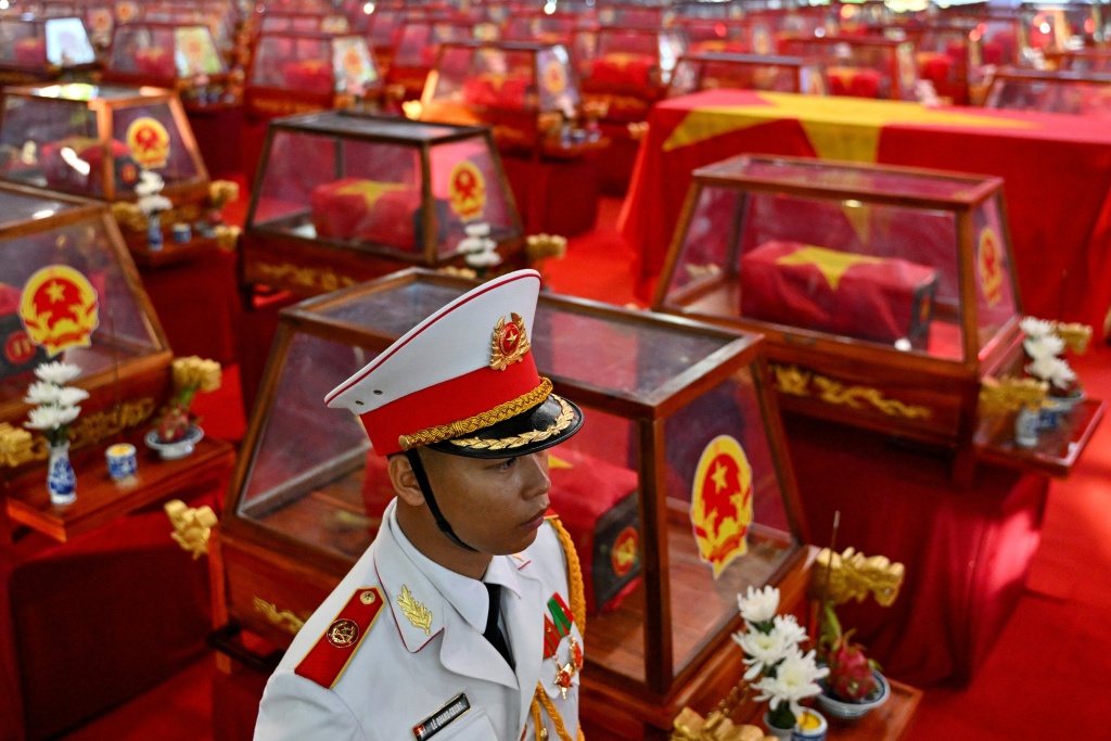 Vietnam mourns hundreds of war dead as it tries to identify the missing decades after wars — Nhac NGUYEN / AFP