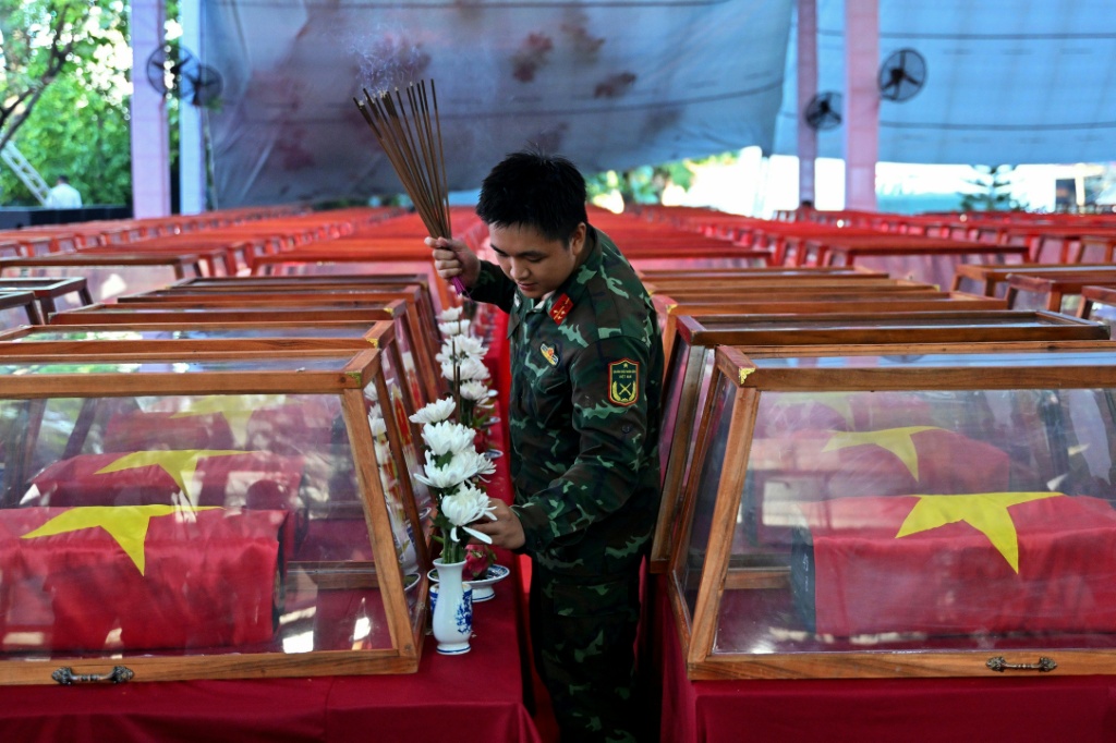 There are 230,000 graves nationwide in Vietnam for unidentified soldiers, while thousands of others are believed to remain buried in remote jungles, or under farmland or other former battlefields — Nhac NGUYEN / AFP