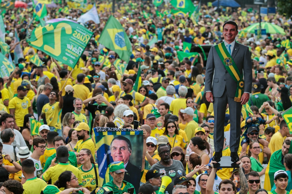 Flavio Bolsonaro has pitched himself as more moderate than his firebrand father — DOUGLAS SHINEIDR / AFP