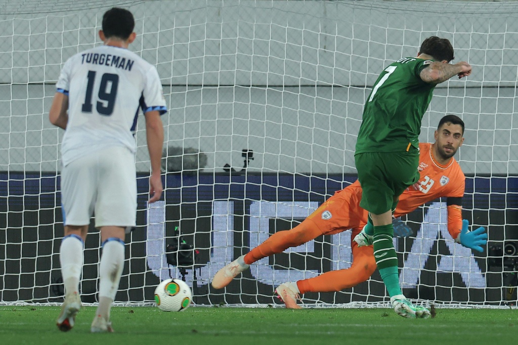 Troy Parrott put Ireland ahead from the penalty spot but Israel drew level — Pedja Milosavljevic / AFP