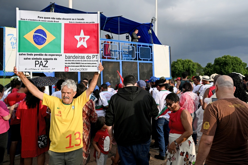Supporters of Brazilian President Luiz Inacio Lula da Silva gather outside the Alvorada Palace to celebrate his birthday in Brasilia — Evaristo Sa / AFP