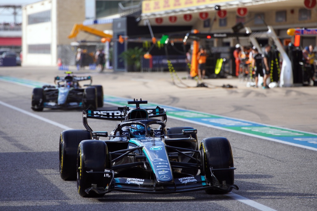 Mercedes' George Russell (R) and Kimi Antonelli exit the pits — Dustin Safranek / AFP