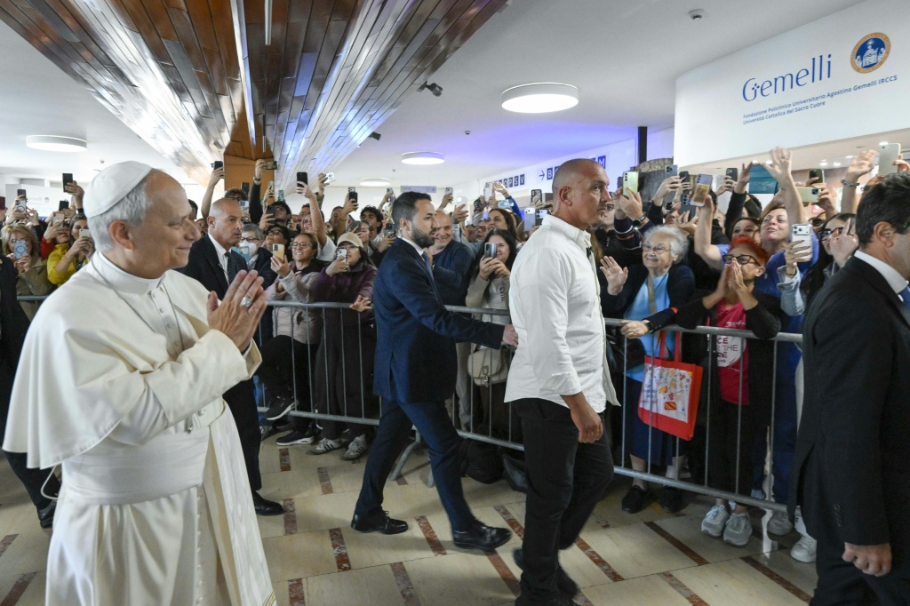 Pope out of bed, progress 'normal', doctors say