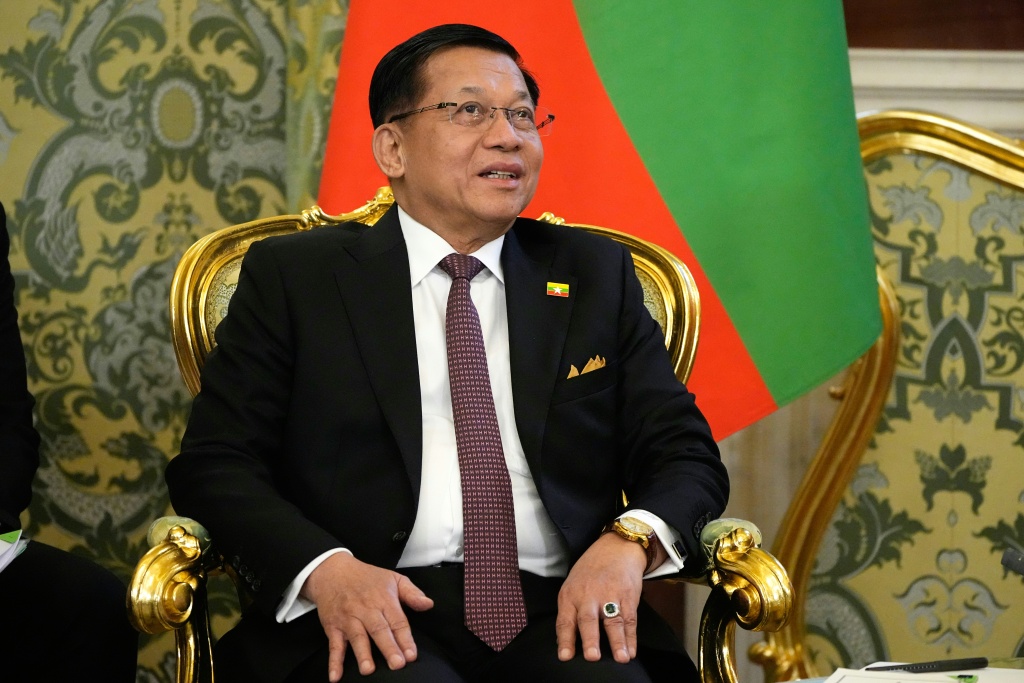Myanmar leader to visit Malaysia after migrant returns begin