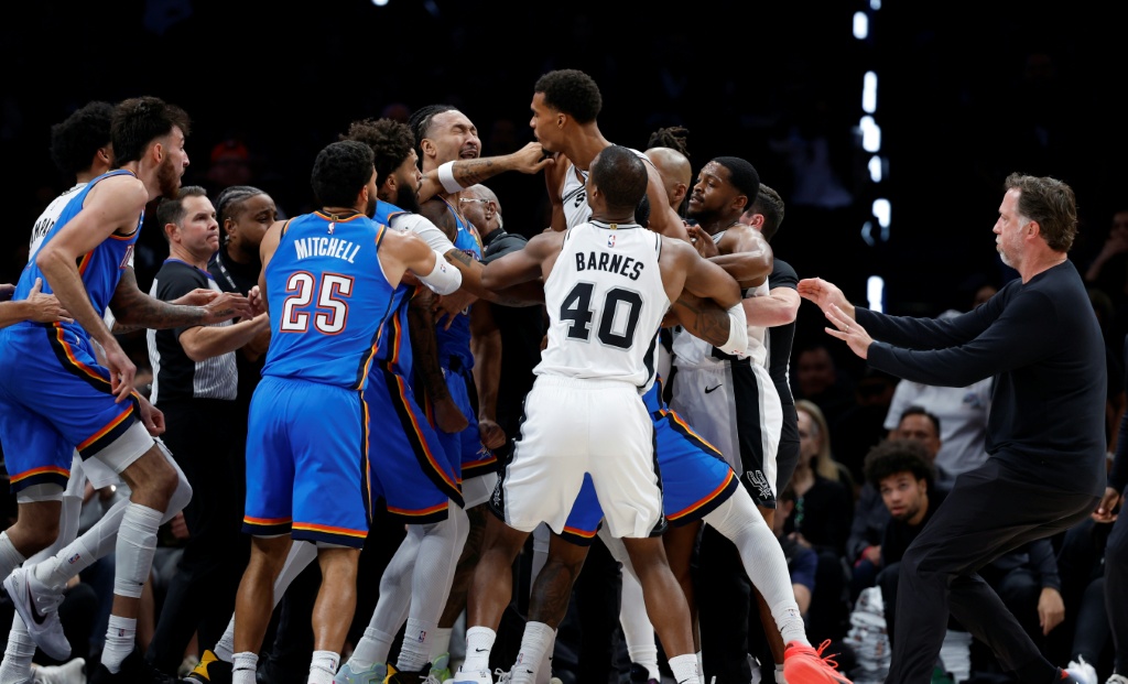 San Antonio's Victor Wembanyama trades shoves with Oklahoma City's Jaylin Williams as tempers flared in the Western Conference rivals' NBA season opener — Ronald Cortes