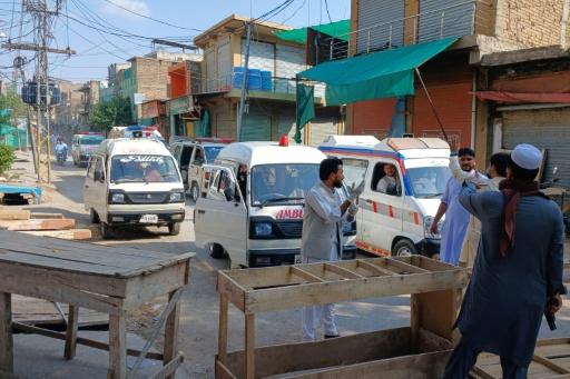 Blast and gun attack at historic police HQ in Pakistan kills 16