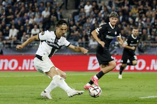 L'attaquant de Rennes Estéban Lepaul (à gauche), le 16 septembre 2026 en Europa League contre Sturm Graz — ERWIN SCHERIAU / AFP