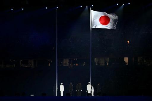 Japan's national flag is being hoisted during the opening ceremony of the 2026 Asian Games — MOHD RASFAN / AFP