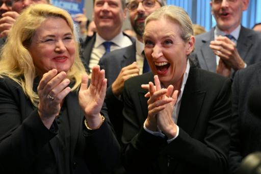 AfD's Alice Weidel (right) celebrated after exit polls — RALF HIRSCHBERGER / AFP