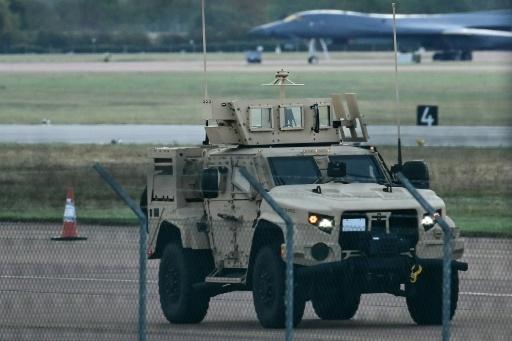 UK police release on bail five men held over airbase incident