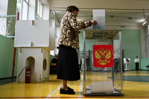 Russia vows revenge for election-day attacks as poll shows ruling party win
