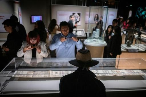 The new exhibit in Mexico City includes several manuscripts, including the Codex Boturini, a 16th-century work depicting the migration of Aztec people from their civilization's mythical birthplace of Aztlan — Carl de Souza / AFP