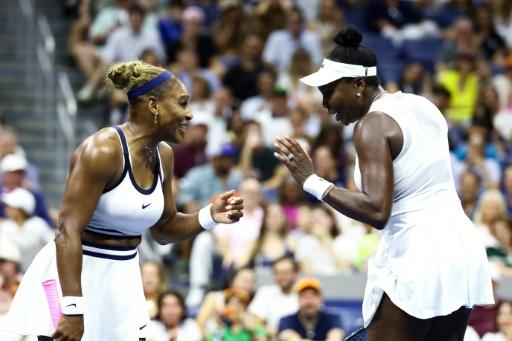 Serena and Venus Williams return to Grand Slam doubles with a loss in the first round at the US Open — CHARLY TRIBALLEAU / AFP