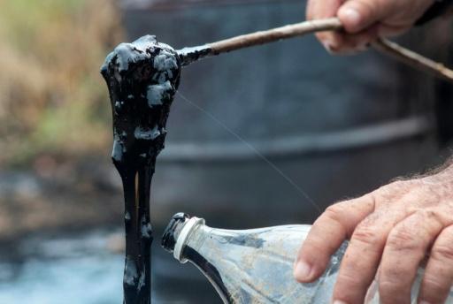 Crude oozes naturally from the ground in this part of Venezuela — Margioni BERMÚDEZ / AFP