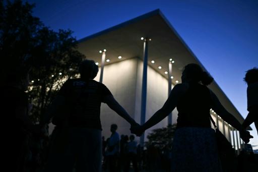 Protesters form human chain at Kennedy Center after Trump threat