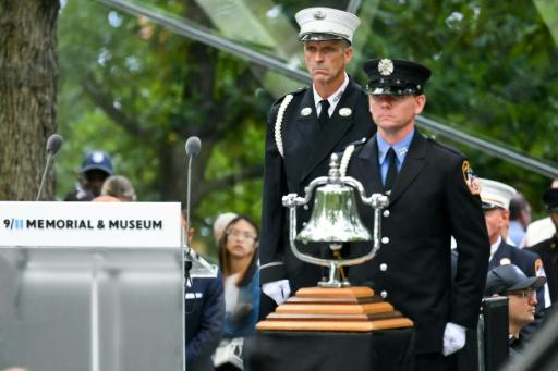 Along with the roll call of 9/11 victims, a bell is rung to mark the key moments in the attack — ANGELA WEISS / AFP