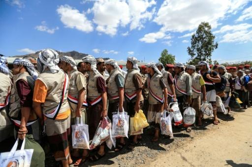 Dozens of prisoners loyal to the Houthis were freed by the group following their offensive — Mohammed HUWAIS / AFP