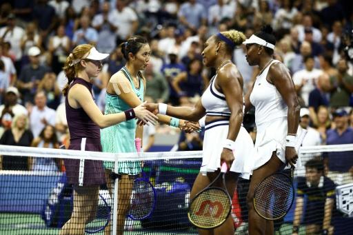 Serena and Venus Williams congratulate Australia's Maya Joint and Taiwan's Chan Hao-ching after their return to Grand Slam doubles ended in the opening round at the US Open — CHARLY TRIBALLEAU / AFP
